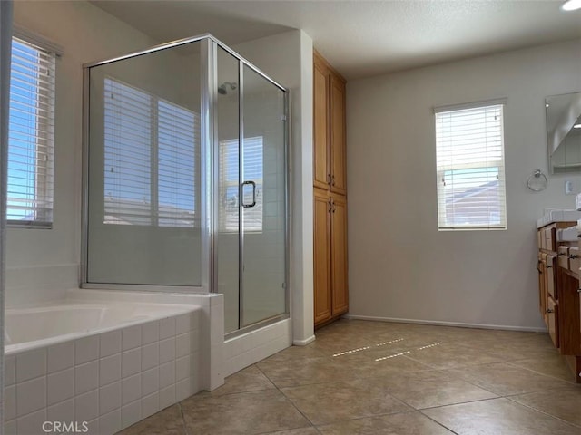 bathroom with vanity, separate shower and tub, and tile patterned flooring