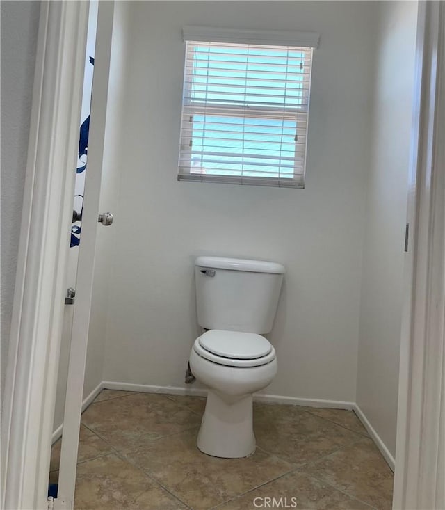 bathroom featuring toilet