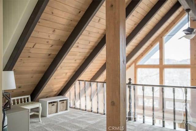 bonus room featuring light carpet, wood ceiling, and lofted ceiling with beams