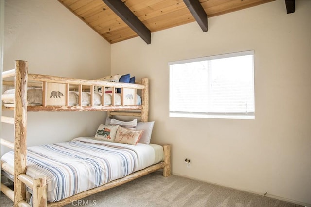 bedroom with wooden ceiling, carpet, and lofted ceiling with beams