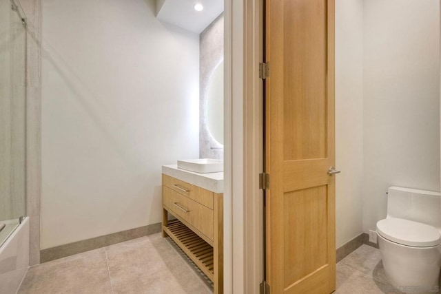 full bathroom with enclosed tub / shower combo, vanity, toilet, and tile patterned flooring