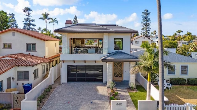 view of front of property featuring a garage