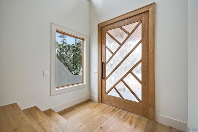 entryway with light wood-type flooring