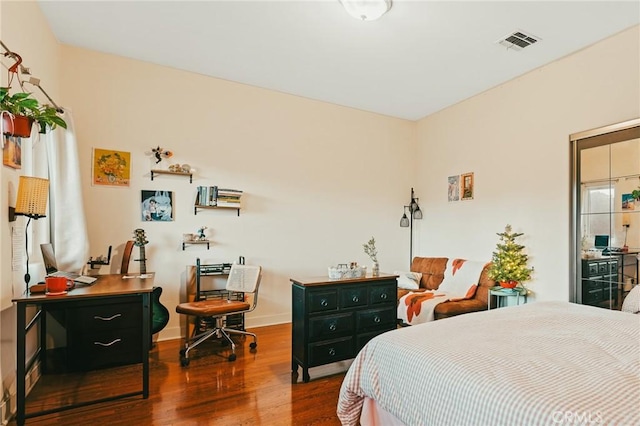 bedroom featuring hardwood / wood-style flooring