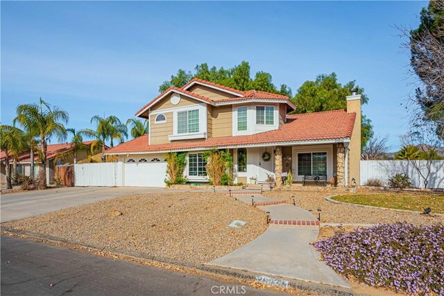 view of front of property featuring a garage