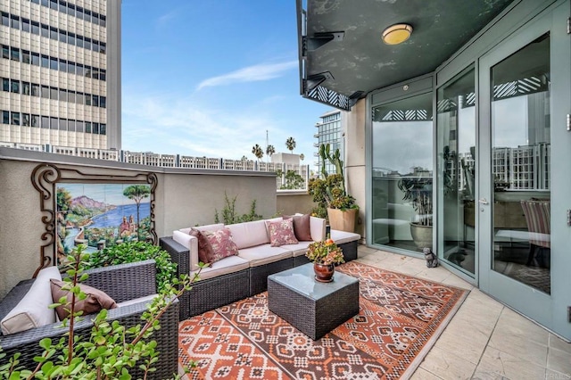 balcony with a patio area and outdoor lounge area