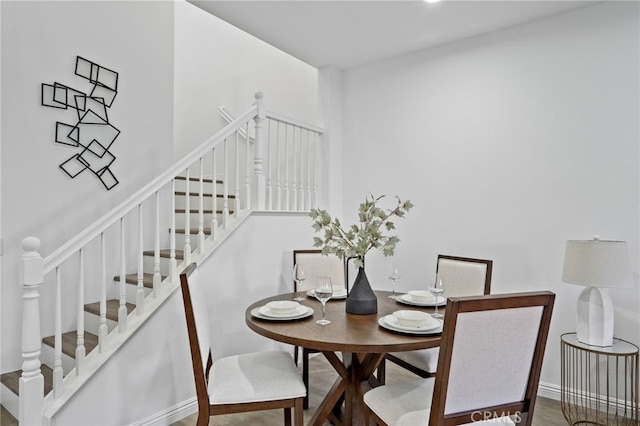 dining area featuring hardwood / wood-style flooring