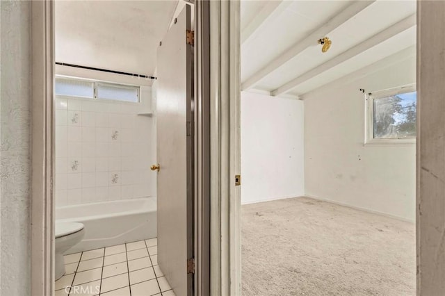 bathroom with vaulted ceiling with beams, tile patterned flooring, and toilet