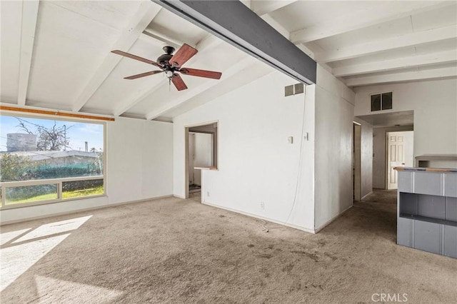 empty room with light carpet, vaulted ceiling with beams, visible vents, and ceiling fan