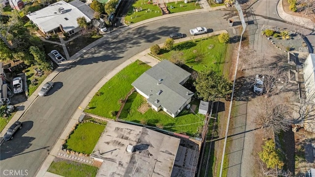 birds eye view of property with a residential view