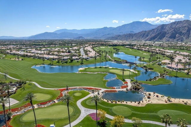 surrounding community featuring a water and mountain view