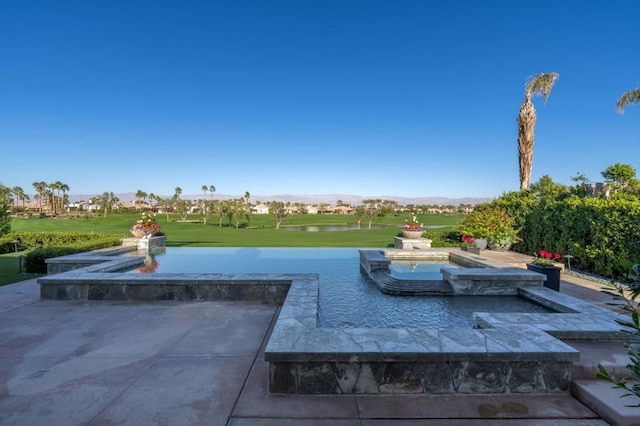 view of patio featuring a water view