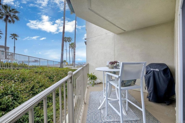 balcony featuring area for grilling