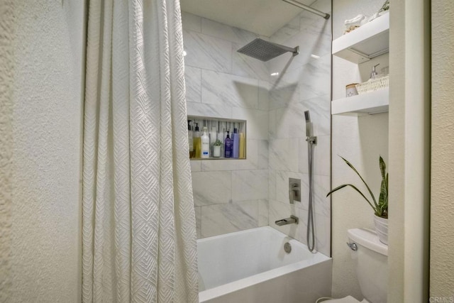 bathroom with toilet and shower / tub combo