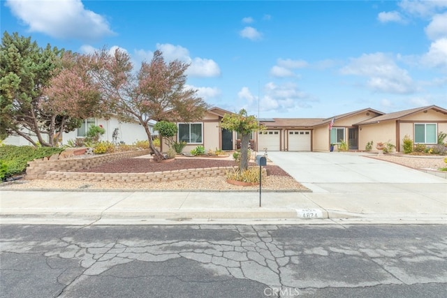 ranch-style house featuring a garage