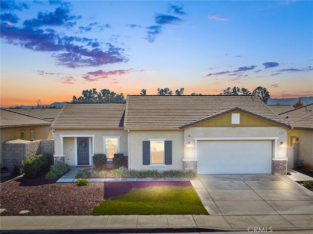 single story home with a garage