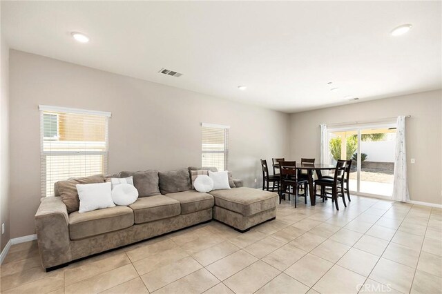 living room featuring light tile patterned floors