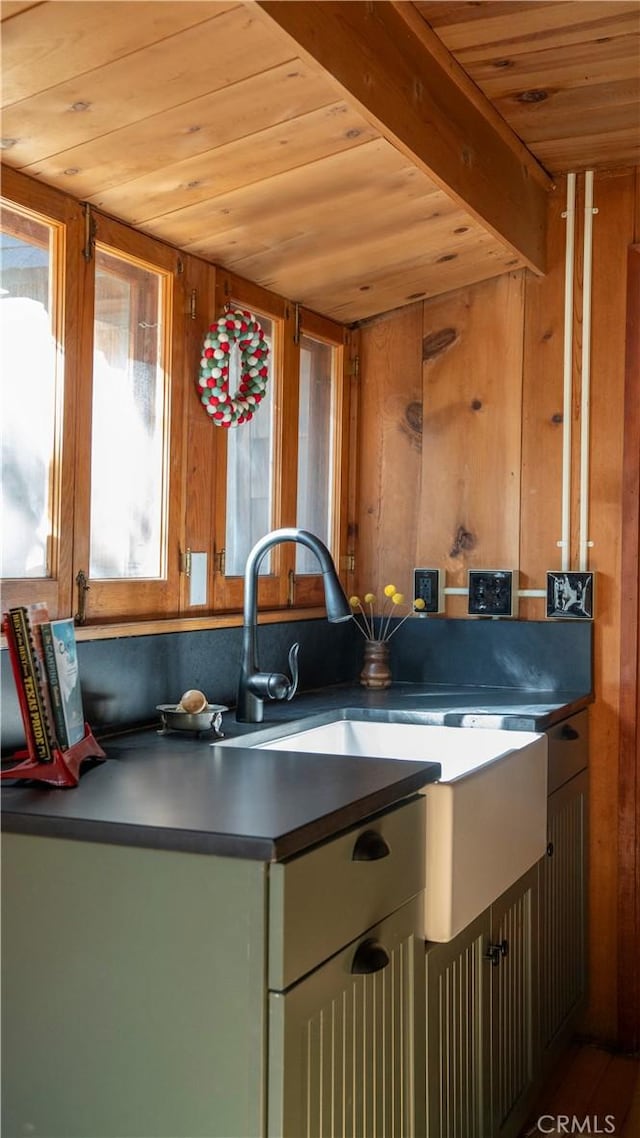 kitchen featuring wooden ceiling, hardwood / wood-style floors, and wood walls