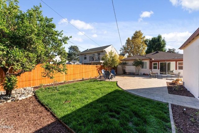 view of yard with a patio area