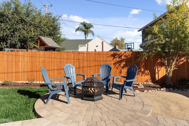 view of patio featuring a fire pit