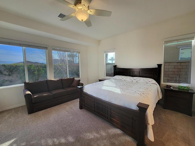 bedroom featuring ceiling fan and carpet flooring