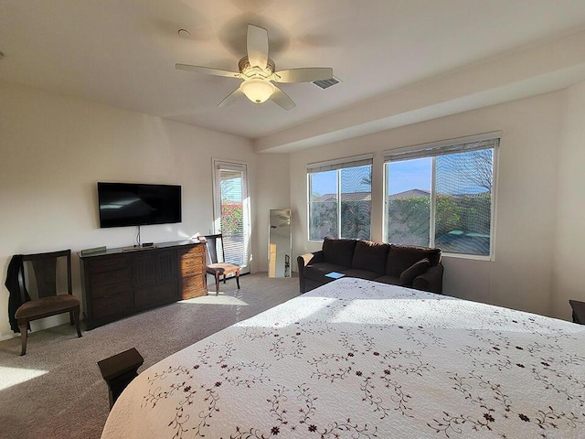 bedroom featuring ceiling fan and carpet floors