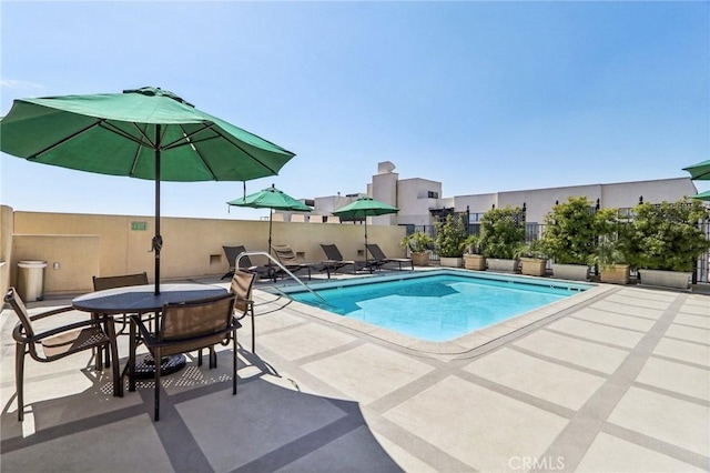 view of pool with a patio