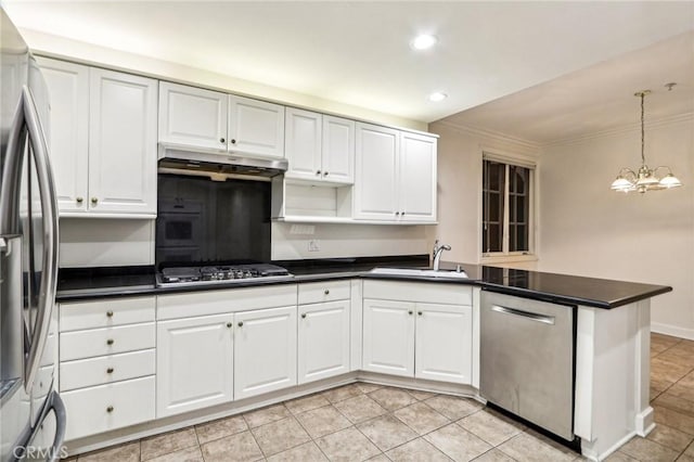 kitchen featuring sink, stainless steel appliances, and white cabinetry