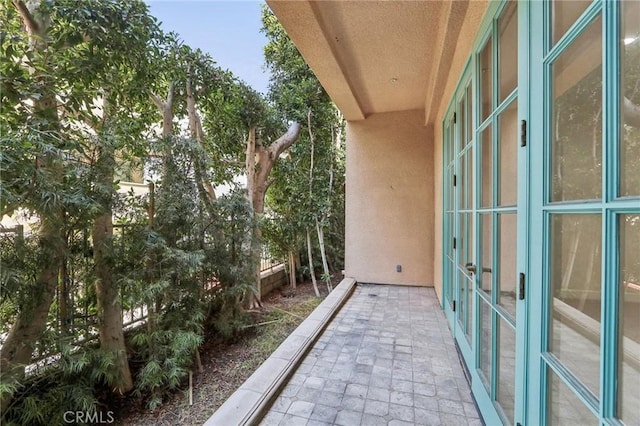 balcony featuring french doors and a patio