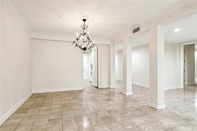 empty room featuring crown molding and a chandelier