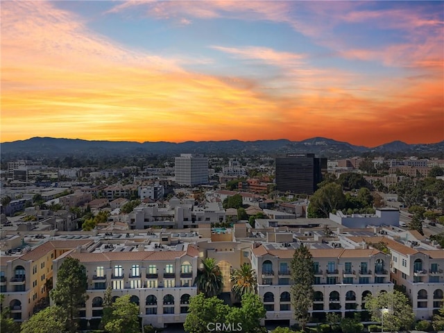 aerial view at dusk with a mountain view