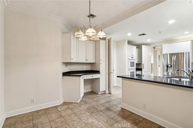 kitchen featuring white cabinets, decorative light fixtures, stainless steel fridge with ice dispenser, ornamental molding, and a chandelier