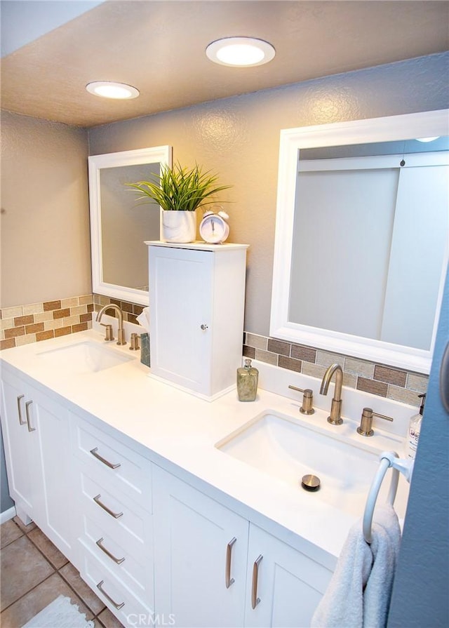 bathroom with vanity and tile patterned flooring