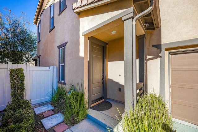 property entrance featuring a garage