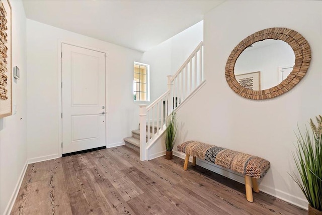 entrance foyer with hardwood / wood-style floors