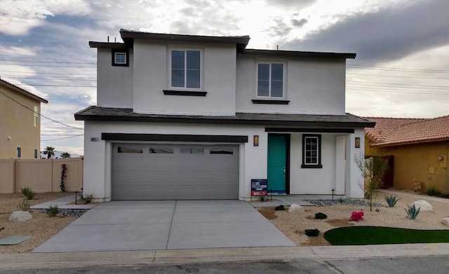 view of property with a garage