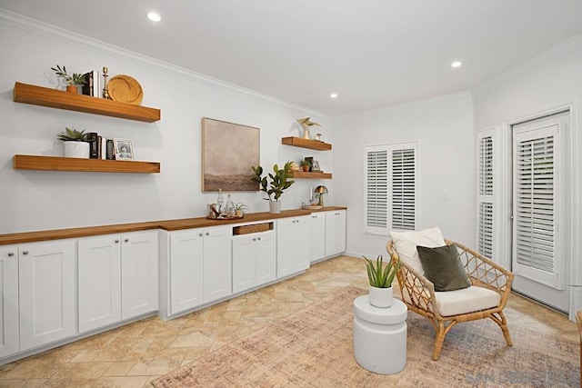 sitting room with crown molding