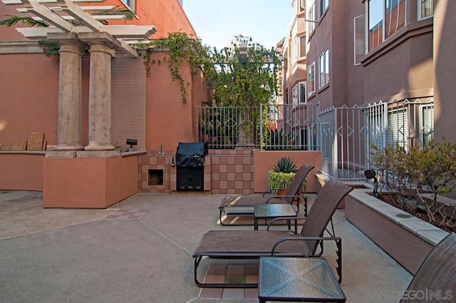 view of patio / terrace with sink and grilling area