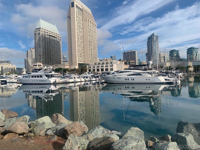 property view of water featuring a dock