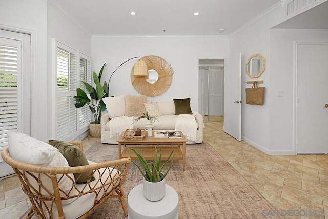 living room featuring crown molding