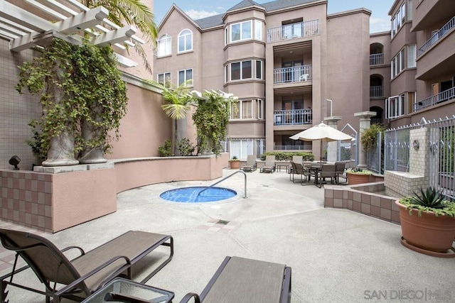 view of pool featuring a pergola and a patio area