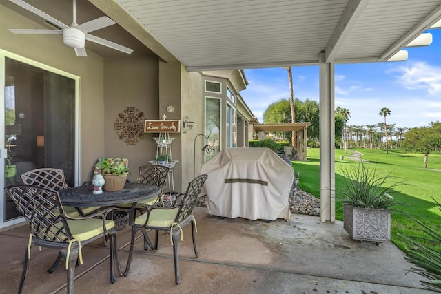 view of patio / terrace with ceiling fan and grilling area