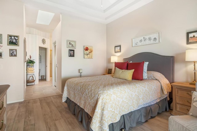 bedroom with light hardwood / wood-style flooring