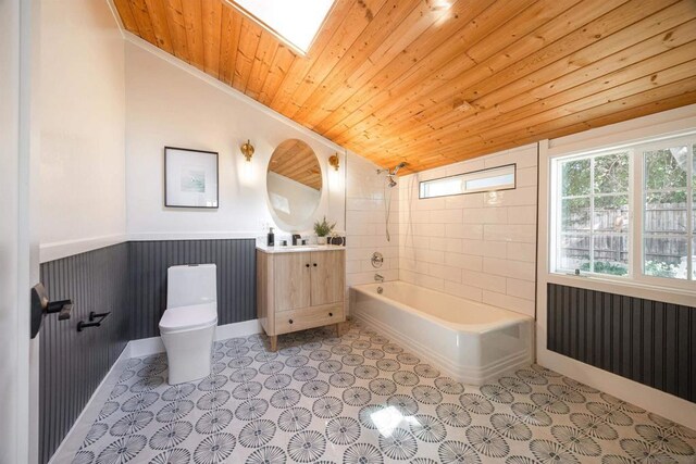 bathroom featuring toilet, vanity, vaulted ceiling, wood ceiling, and radiator heating unit