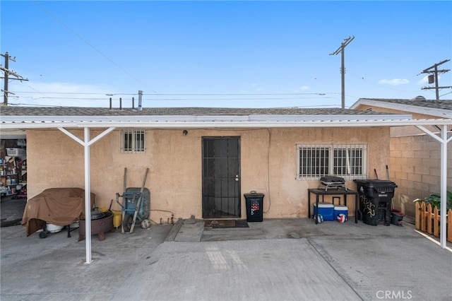 back of house featuring a patio