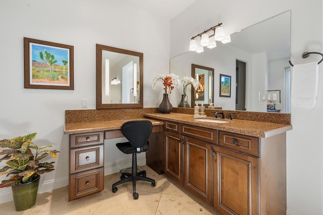 bathroom with tile patterned flooring and vanity