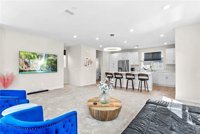 living room with light carpet