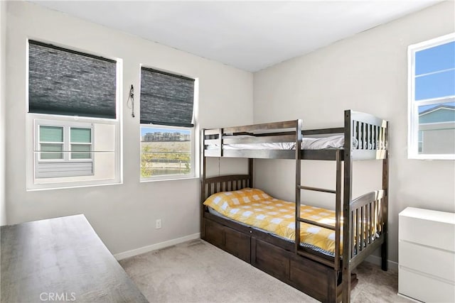 bedroom with light carpet