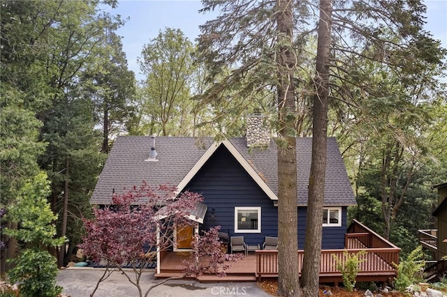 rear view of house with a deck