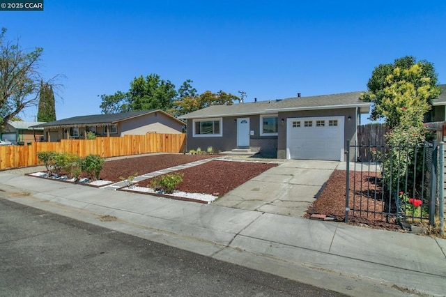 single story home with a garage